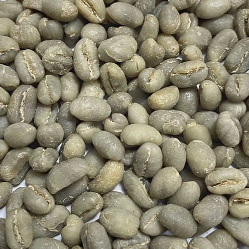 Peaberry coffee beans — single rounded seeds rather than the usual flat-sided pair.